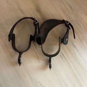 Women’s Spurs with leather strap.